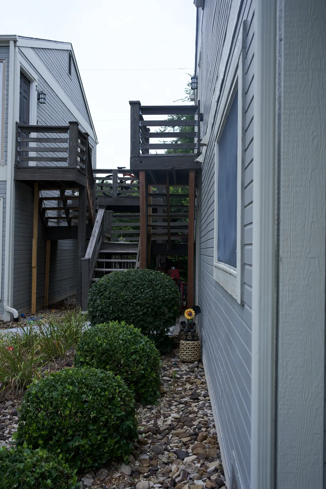 New composite deck boards cut in neatly around an existing skylight