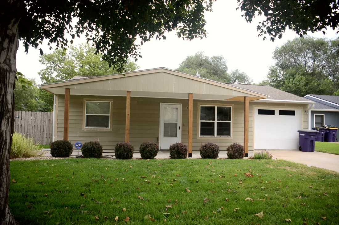 Front porch with cedar posts and new lap siding on a Manhattan, Kansas ranch home
