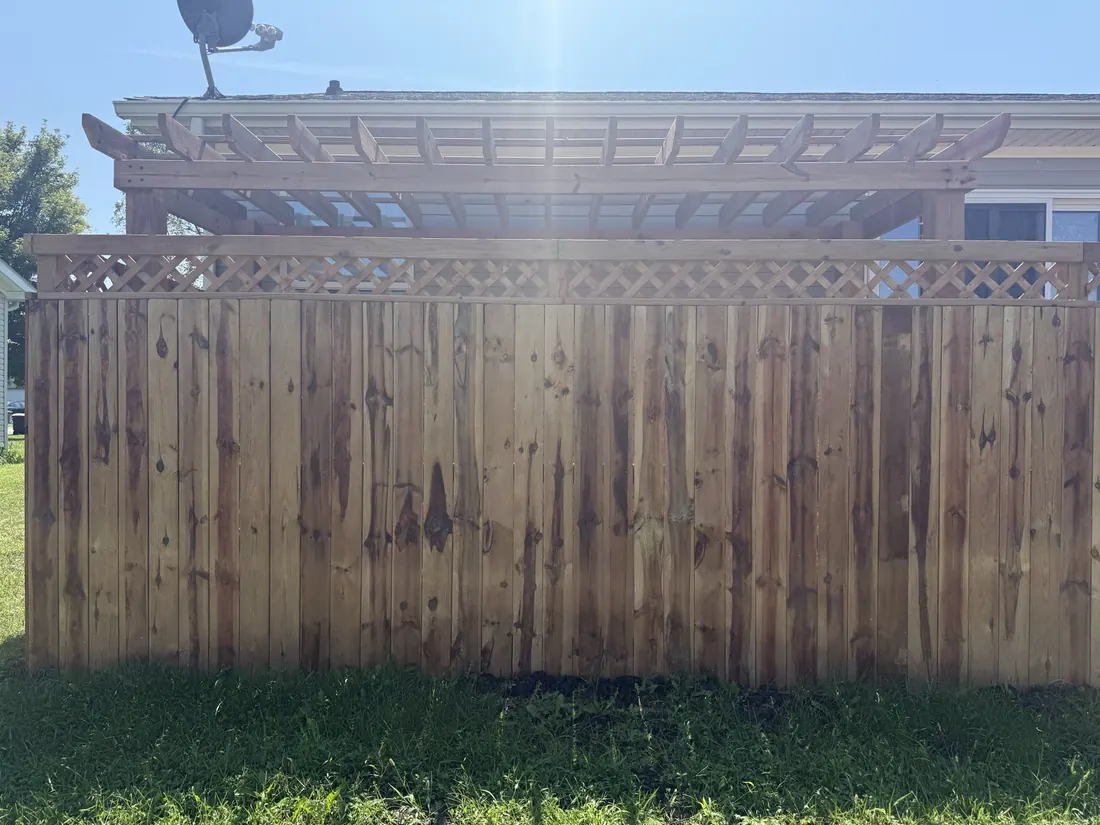 Cedar privacy fence closing off the back of a yard