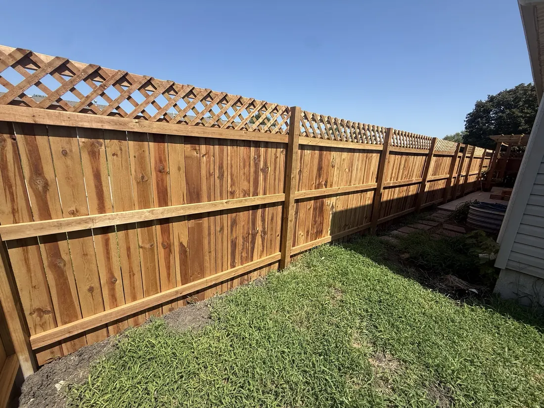 Close view of the boards and rails on a new cedar fence