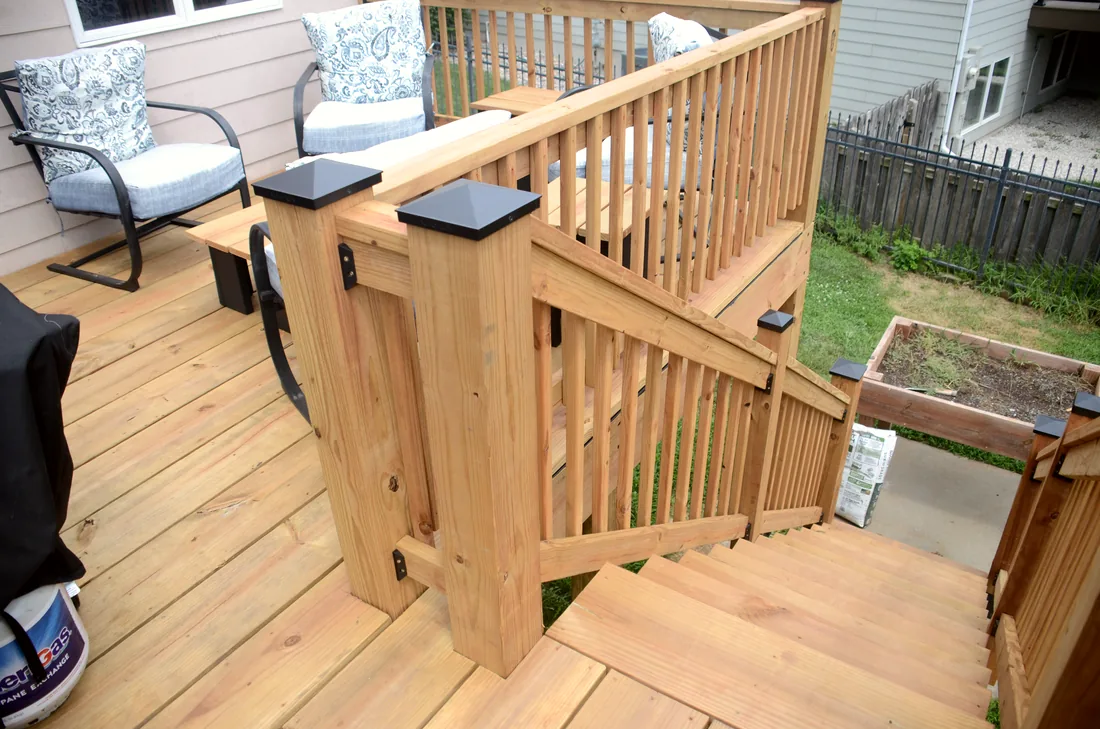 Cedar railing, stair gate and built in planter on an elevated deck